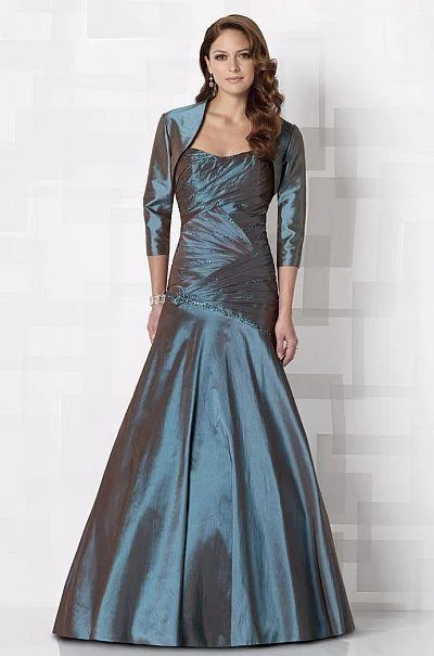 Plus size dresses featuring pleated skirts flow nicely -Mon Cheri - Long Dress In Patina 212673