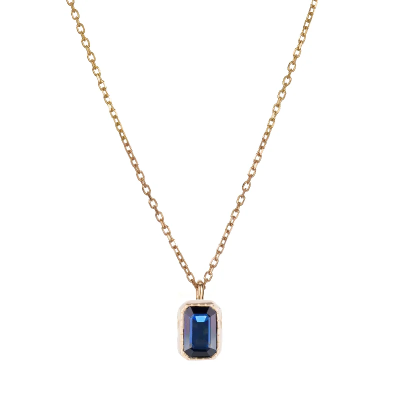 Best necklaces and pendants with intricate filigree for vintage-inspired elegance-Emerald Cut Sapphire Wisp Necklace