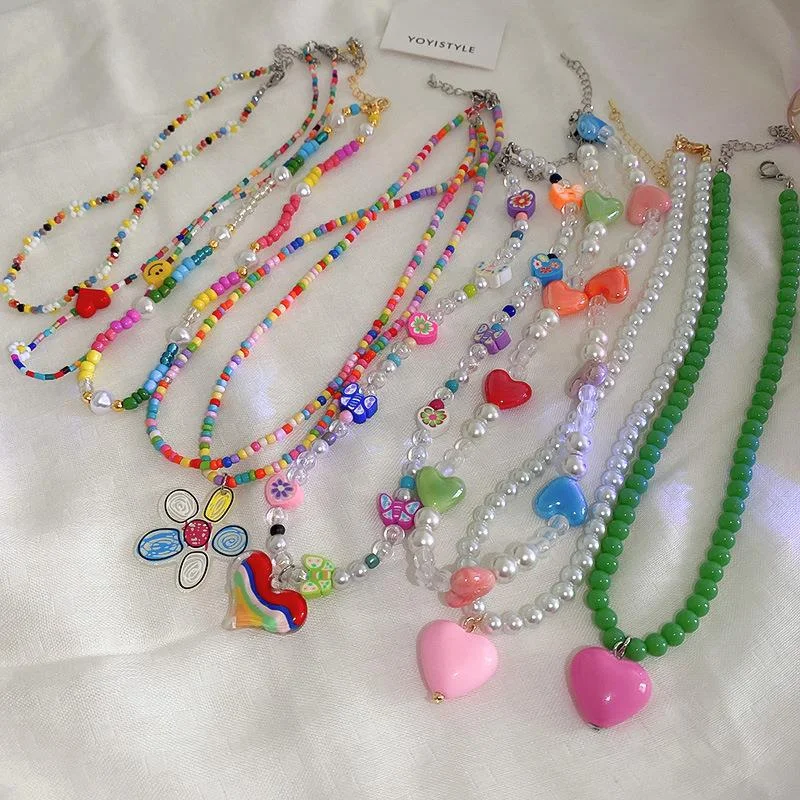 Necklaces and pendants with pearls for a classic and sophisticated touch-Wholesale Crystal Pearl Flower Heart Plastic Beaded Necklaces