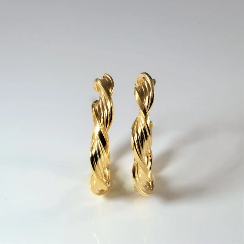 Best hoop earrings with textured silver for a rustic and organic finish-Twisted Yellow Gold Hoops |